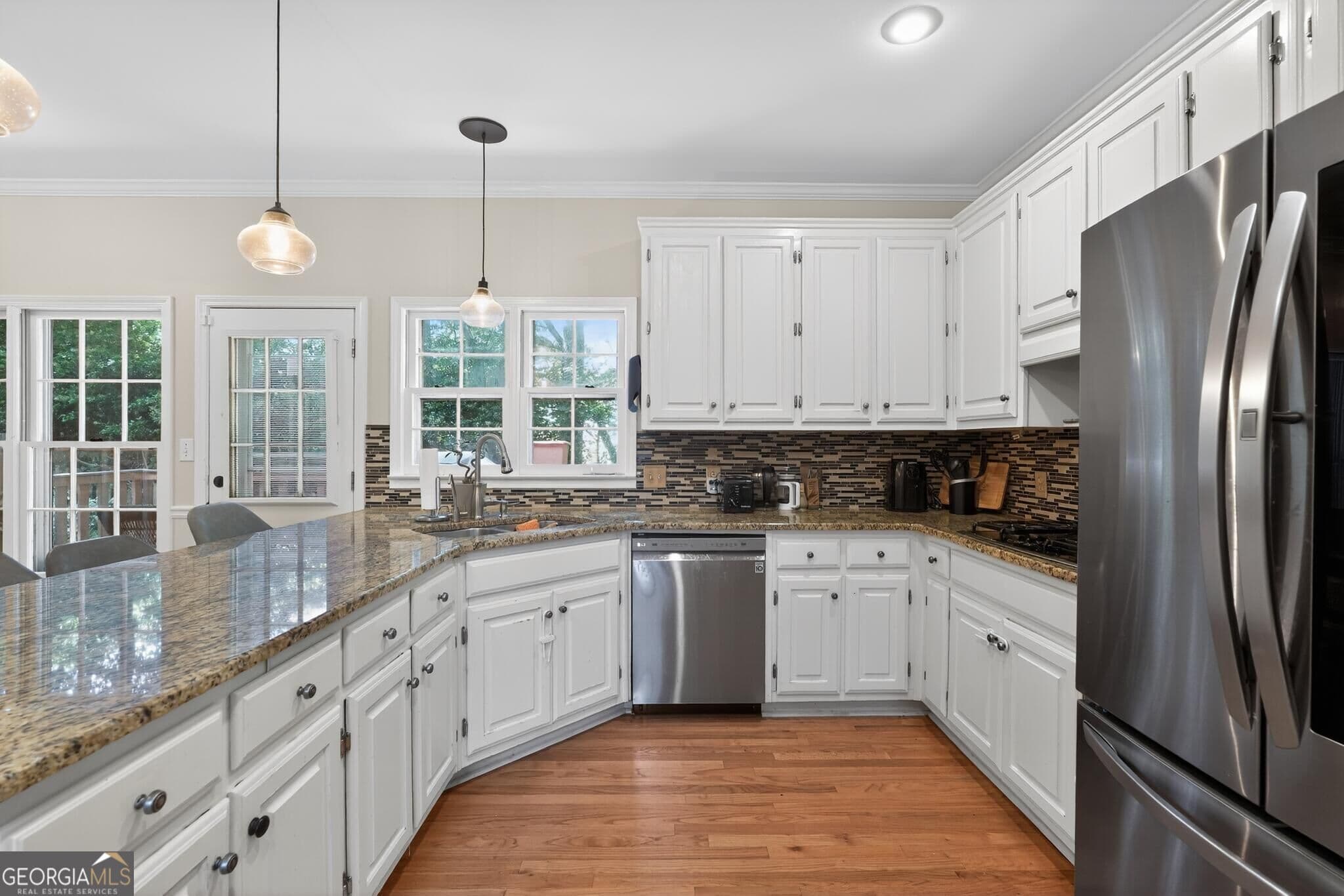 5 bedroom, 3.5 bathroom, 3,540 sq ft single family residence for sale at 1227 Camden Hunt Drive, Lawrenceville, GA 30043 — photo 5