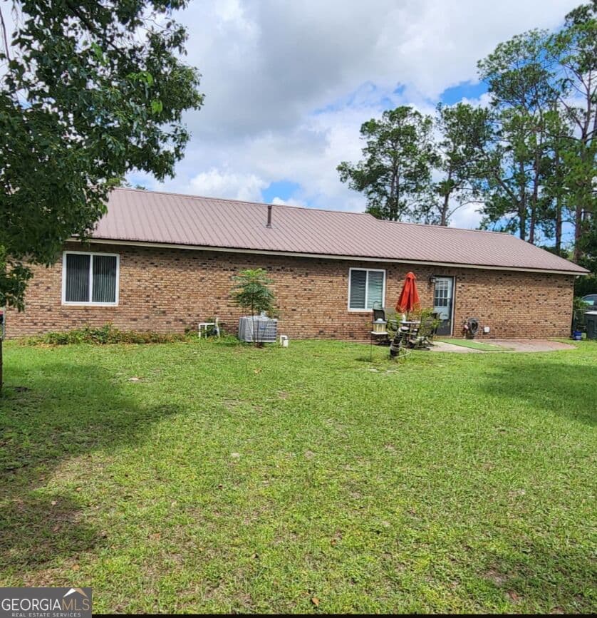 3 bedroom, 1.5 bathroom, 1,835 sq ft single family residence for sale at 775 S 6Th Street, Jesup, GA 31545 — photo 4