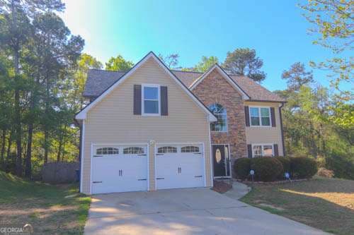 4 bedroom, 2.5 bathroom, 2,855 sq ft single family residence sold at 6879 Smoke Ridge Drive, Atlanta, GA 30349