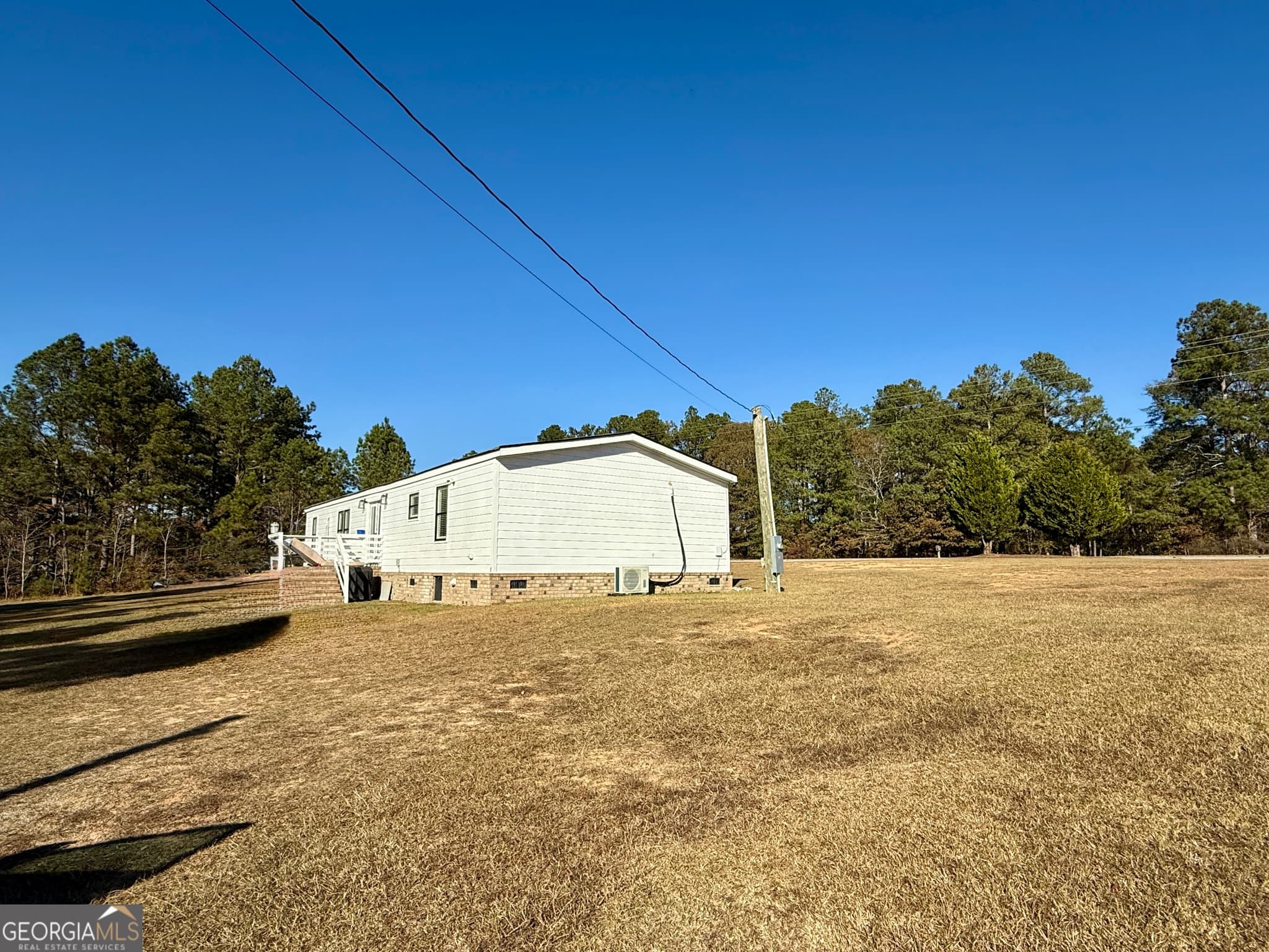 4 bedroom, 2 bathroom, 1,440 sq ft manufactured home,mobile home under contract at 10199 Ga Highway 296, Stapleton, GA 30823 — photo 8