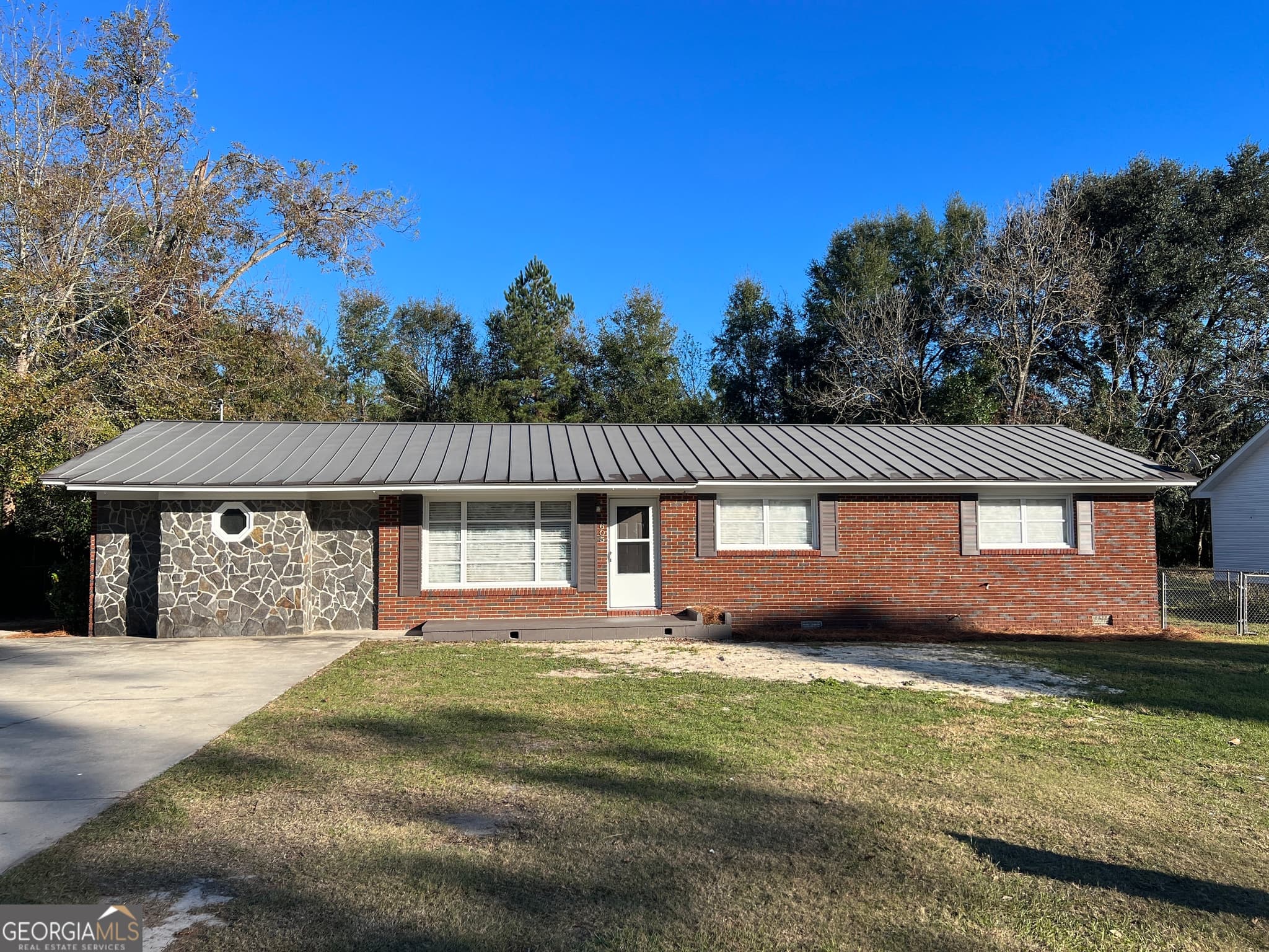 4 bedroom, 2.5 bathroom, 1,651 sq ft single family residence sold at 605 S Leroy Street, Metter, GA 30439