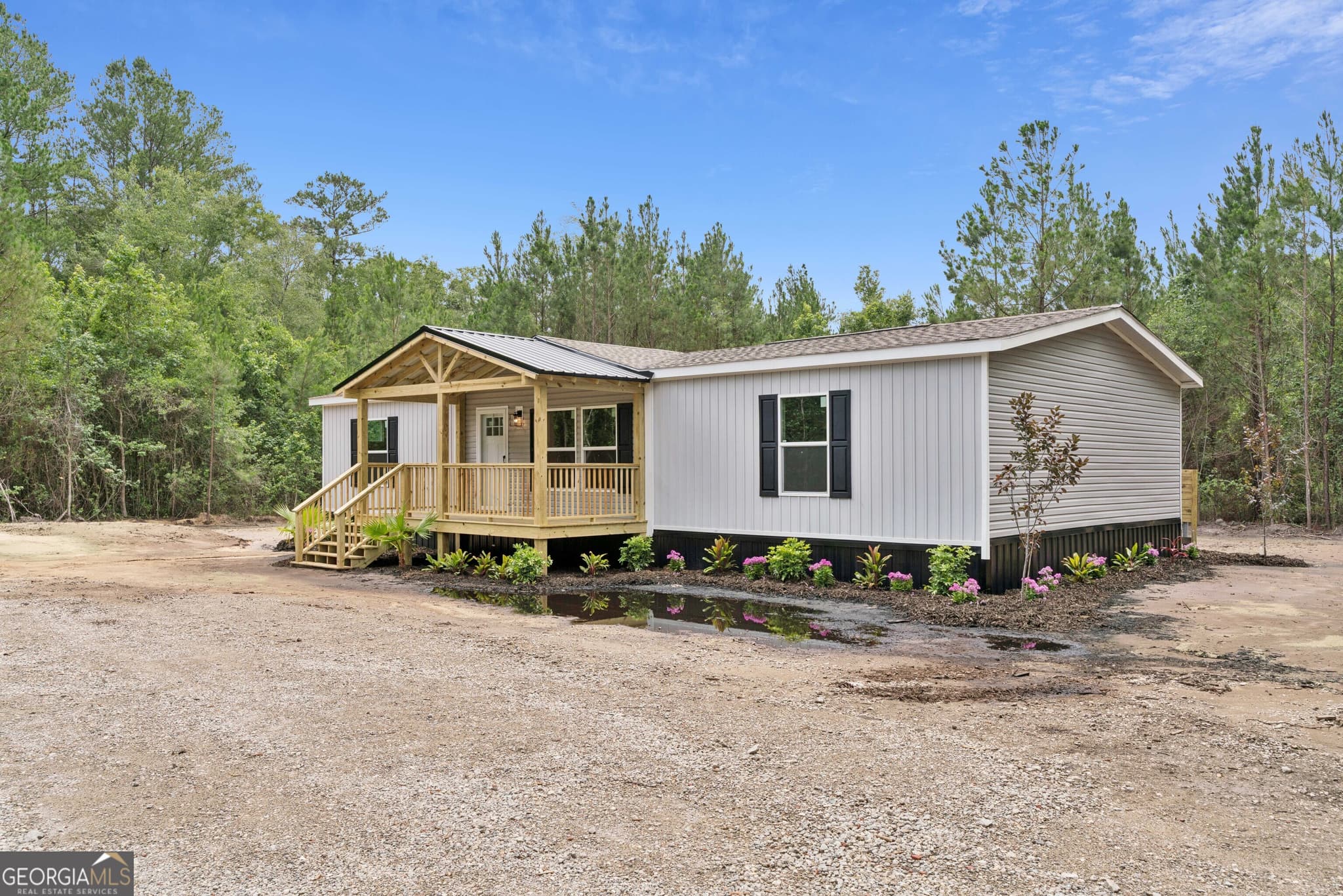 3 bedroom, 2 bathroom, 1,475 sq ft manufactured home,single family residence for sale at 9 N Riverhill Trail, Brunswick, GA 31525 — photo 2