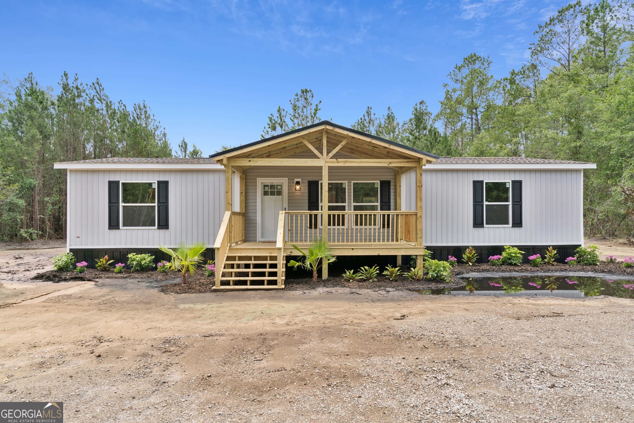 3 bedroom, 2 bathroom, 1,475 sq ft manufactured home,single family residence for sale at 9 N Riverhill Trail, Brunswick, GA 31525 — photo 3