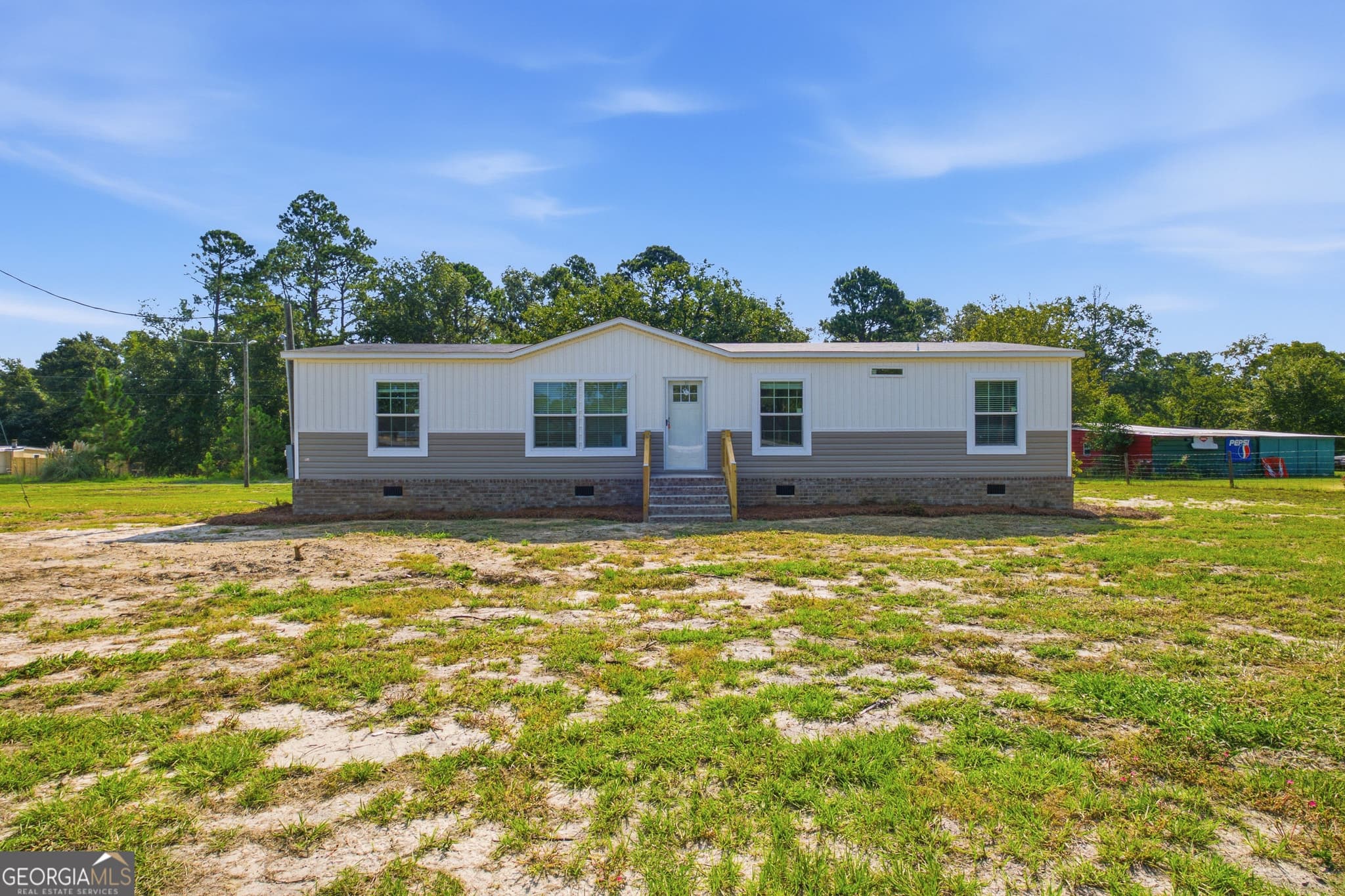 4 bedroom, 2.5 bathroom, 1,568 sq ft manufactured home,single family residence for sale at 1137 5th Avenue, Twin City, GA 30471