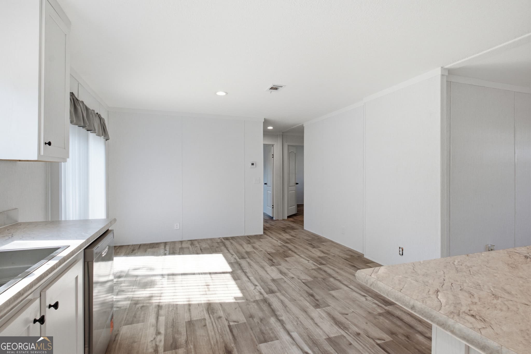 4 bedroom, 2.5 bathroom, 1,568 sq ft manufactured home,single family residence for sale at 1137 5th Avenue, Twin City, GA 30471 — photo 9