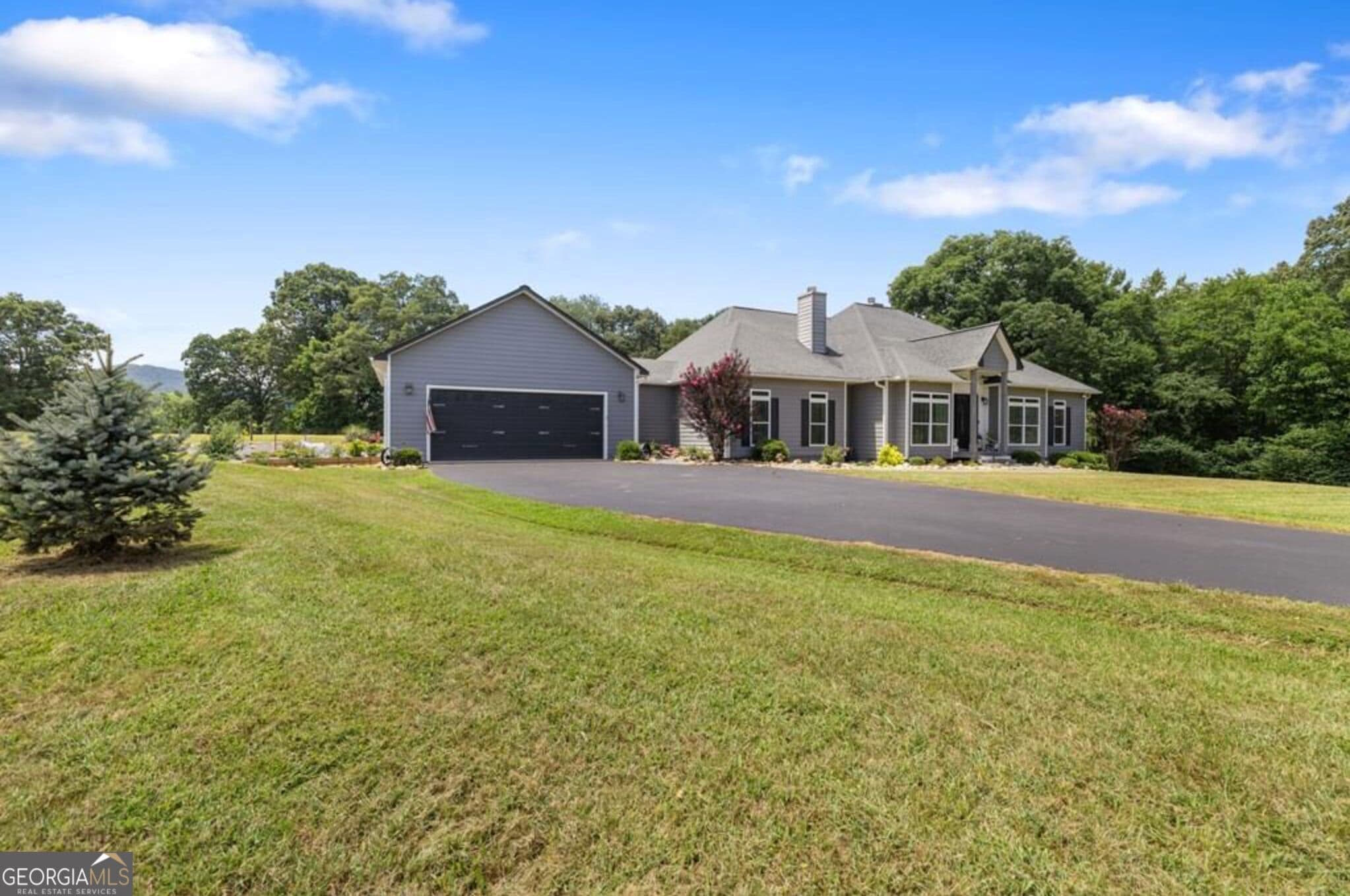 4 bedroom, 3.5 bathroom, 3,193 sq ft single family residence for sale at 1502 Smithfield Lane, Young Harris, GA 30582 — photo 2