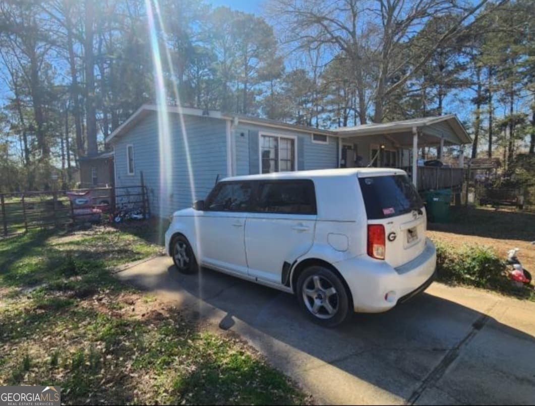 3 bedroom, 2 bathroom, 1,200 sq ft manufactured home,single family residence for sale at 798 Peeksville Road, Locust Grove, GA 30248 — photo 2