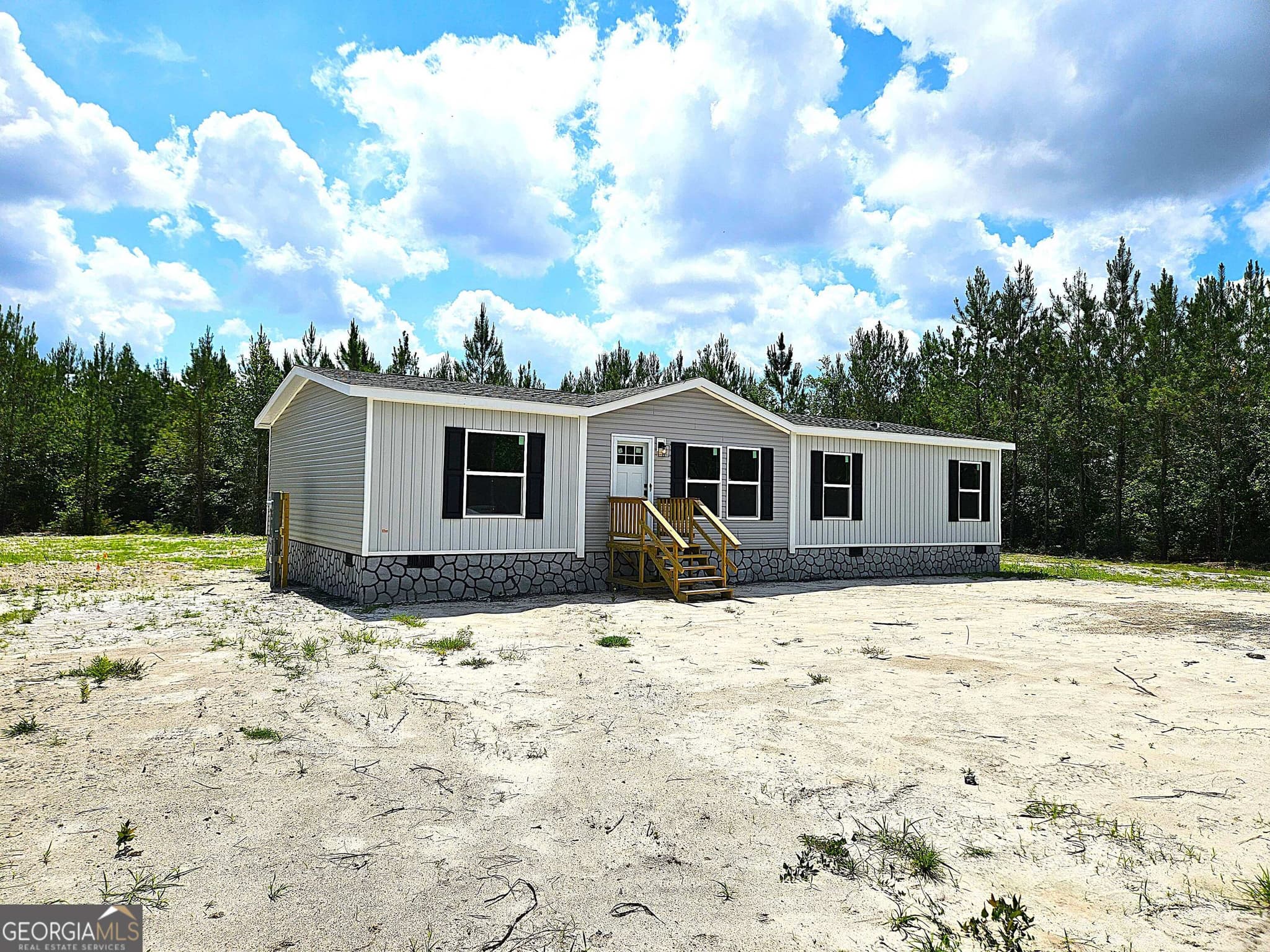 4 bedroom, 2 bathroom, 1,475 sq ft manufactured home,single family residence sold at 1000 Boots Harrison Road, Hortense, GA 31543