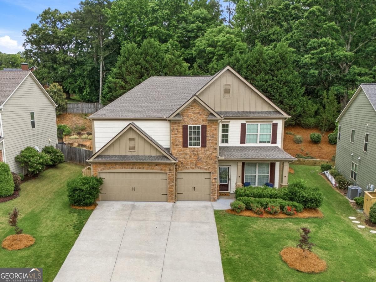6 bedroom, 4 bathroom, 3,753 sq ft single family residence sold at 5845 Willow Oak Pass, Cumming, GA 30040