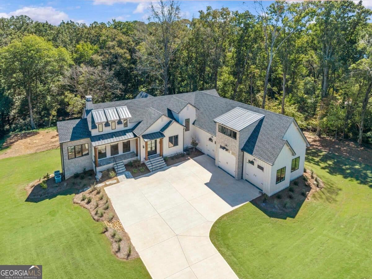 5 bedroom, 6 bathroom, 5,427 sq ft single family residence for sale at 1110 Sunset Bluff, Greensboro, GA 30642 — photo 2