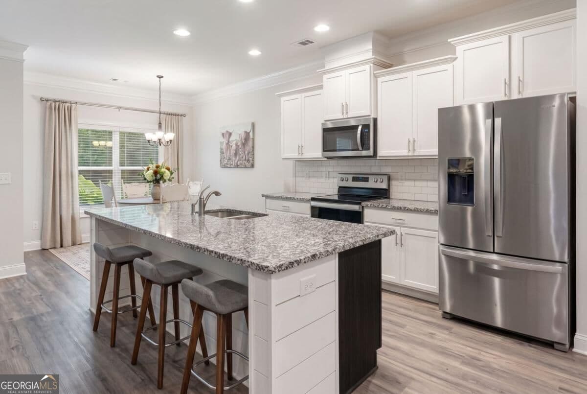 4 bedroom, 3 bathroom, 2,081 sq ft single family residence for sale at 223 Manor Drive, Hull, GA 30646 — photo 6