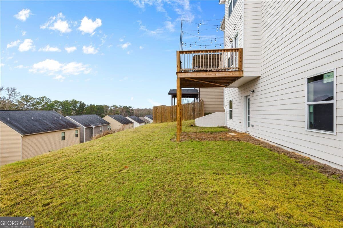 4 bedroom, 2.5 bathroom single family residence for sale at 3414 Enterkin Lane, Atlanta, GA 30349 — photo 8