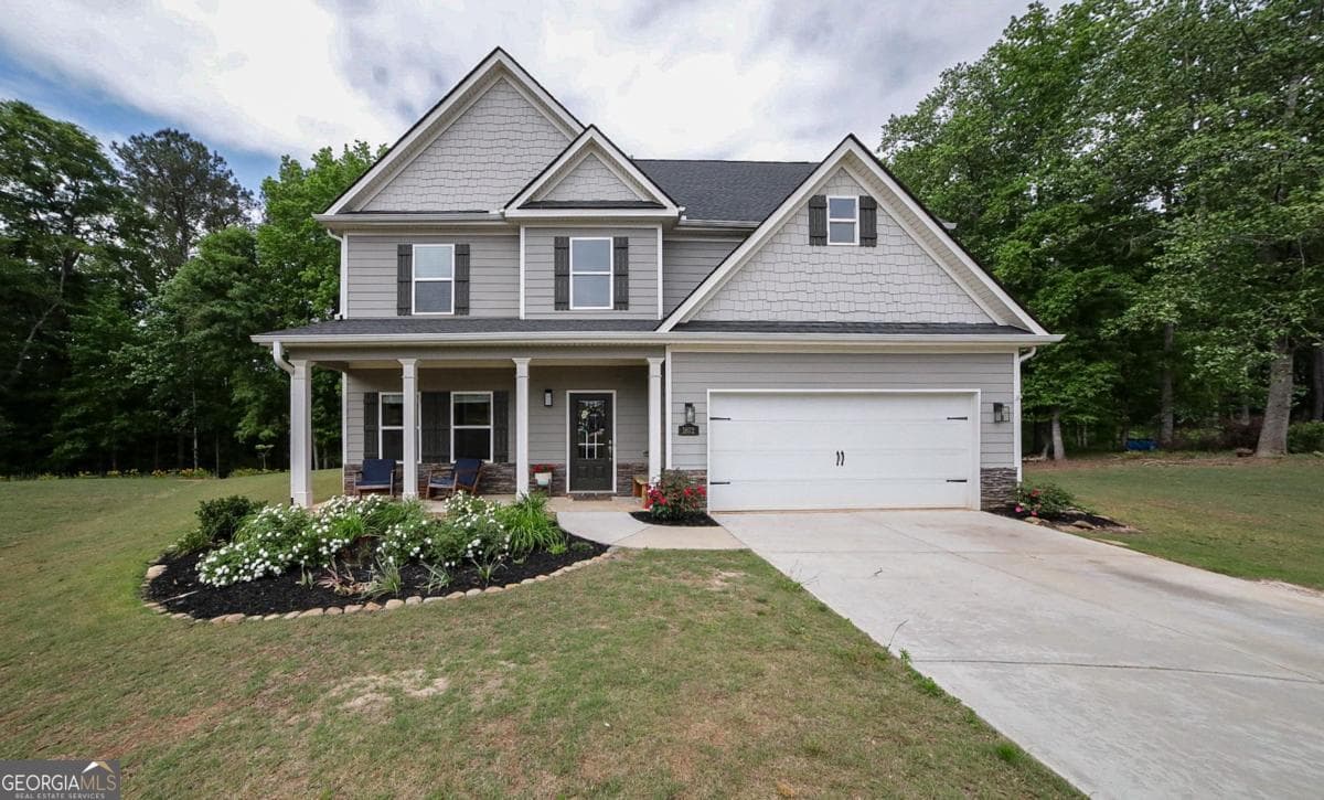 4 bedroom, 2.5 bathroom, 2,368 sq ft single family residence sold at 1672 Carriage Court, Monroe, GA 30656