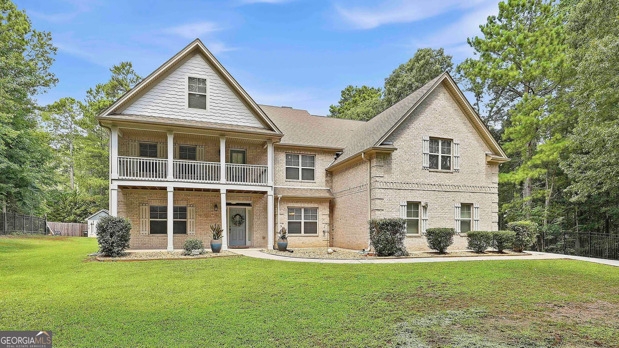 5 bedroom, 5 bathroom, 5,682 sq ft single family residence for sale at 114 Ranan Lane, Newnan, GA 30263 — photo 1 of 65