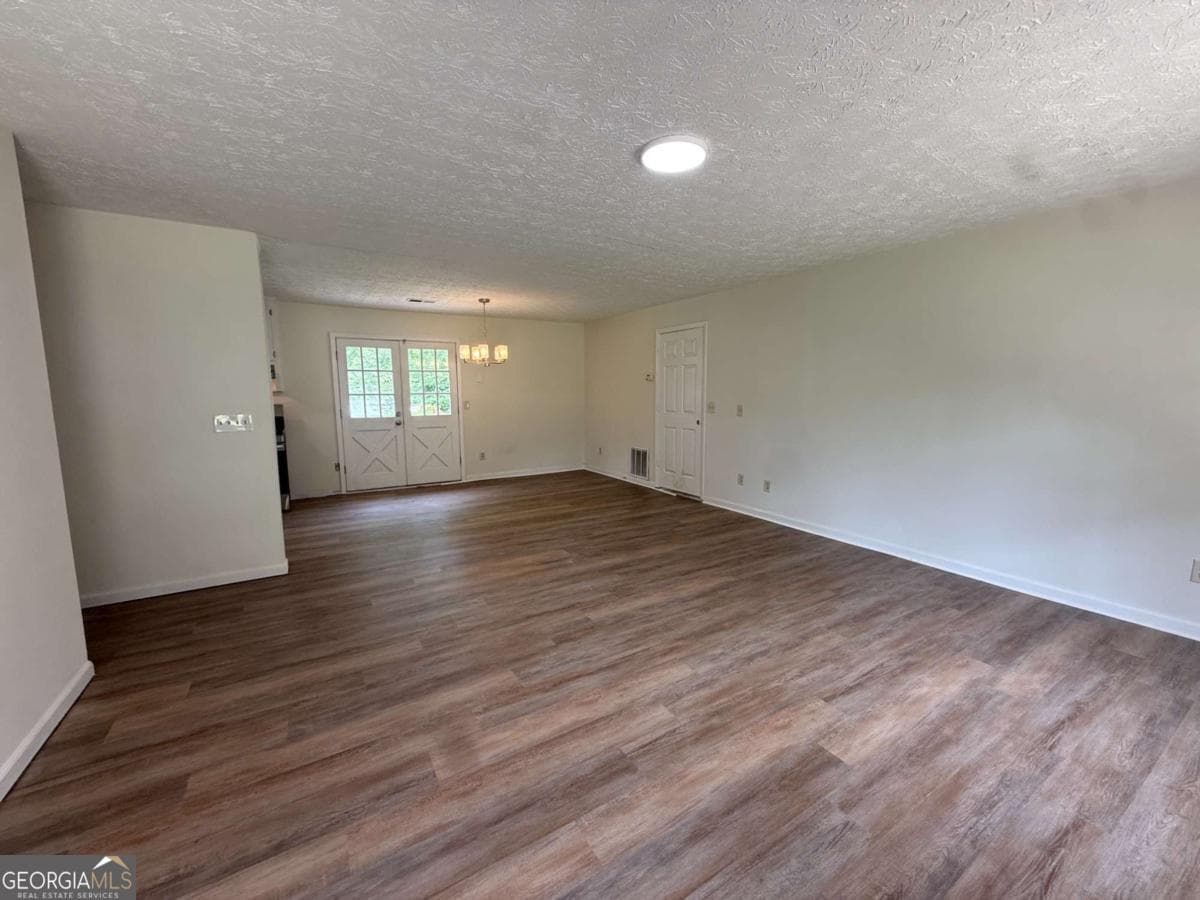 4 bedroom, 1.5 bathroom, 1,456 sq ft single family residence for sale at 3165 Delhi Drive, Powder Springs, GA 30127 — photo 6