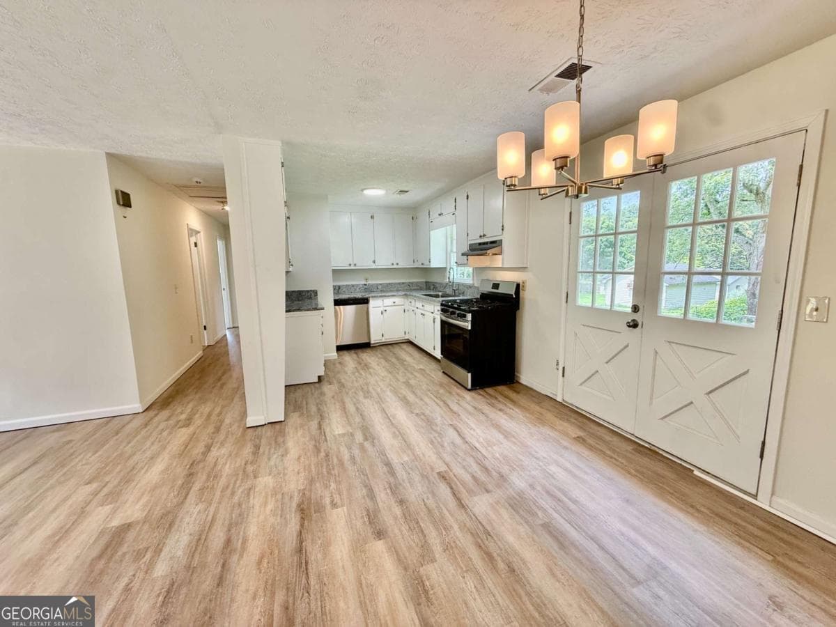 4 bedroom, 1.5 bathroom, 1,456 sq ft single family residence for sale at 3165 Delhi Drive, Powder Springs, GA 30127 — photo 5
