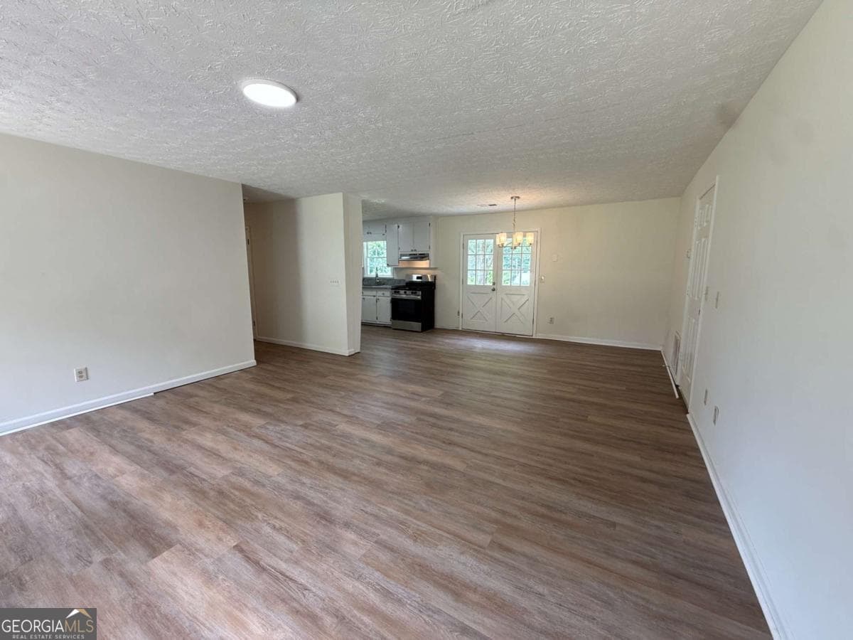 4 bedroom, 1.5 bathroom, 1,456 sq ft single family residence for sale at 3165 Delhi Drive, Powder Springs, GA 30127 — photo 4