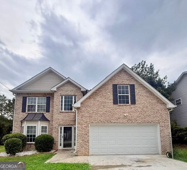 4 bedroom, 2.5 bathroom, 2,349 sq ft single family residence for sale at 7058 Red Maple Lane, Lithonia, GA 30058 — photo 1 of 27