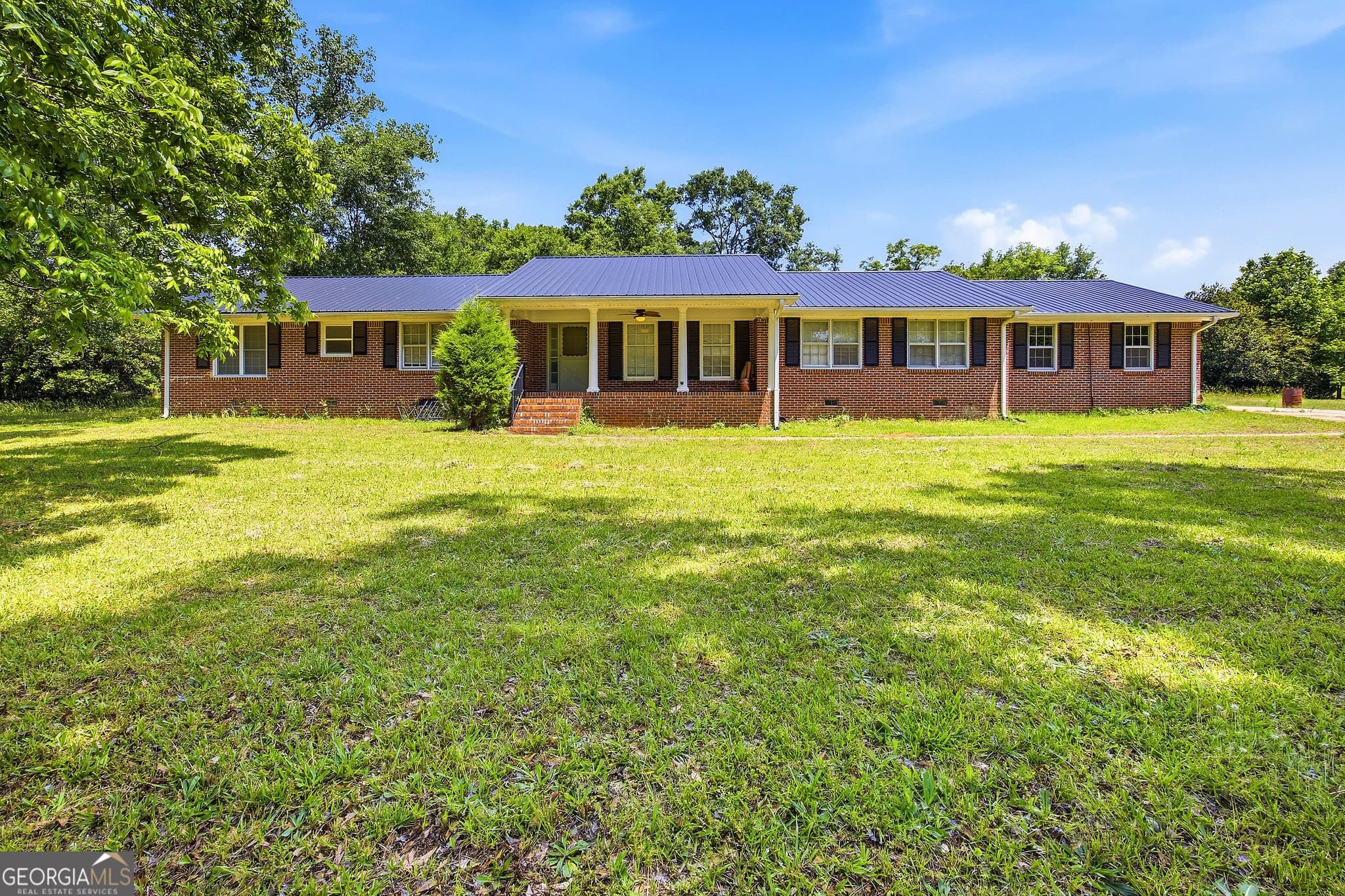 4 bedroom, 2.5 bathroom single family residence for sale at 1761 Highway 16, Jackson, GA 30233