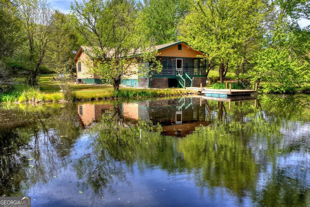 3 bedroom, 2 bathroom, 2,080 sq ft cabin,single family residence for sale at 111 Candlewood Lane, Blue Ridge, GA 30513 — photo 1 of 57