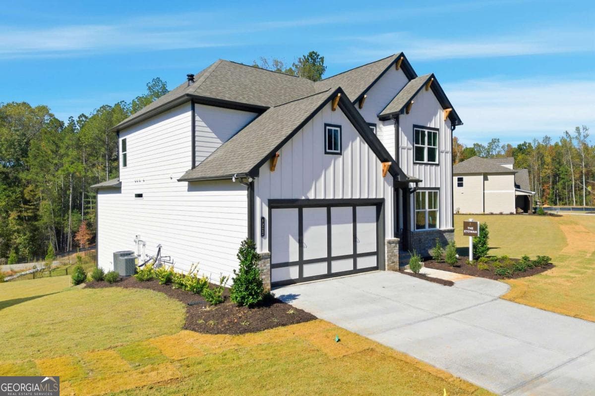 4 bedroom, 3 bathroom, 2,906 sq ft single family residence for sale at 1209 Sterlington Drive, Canton, GA 30115 — photo 2