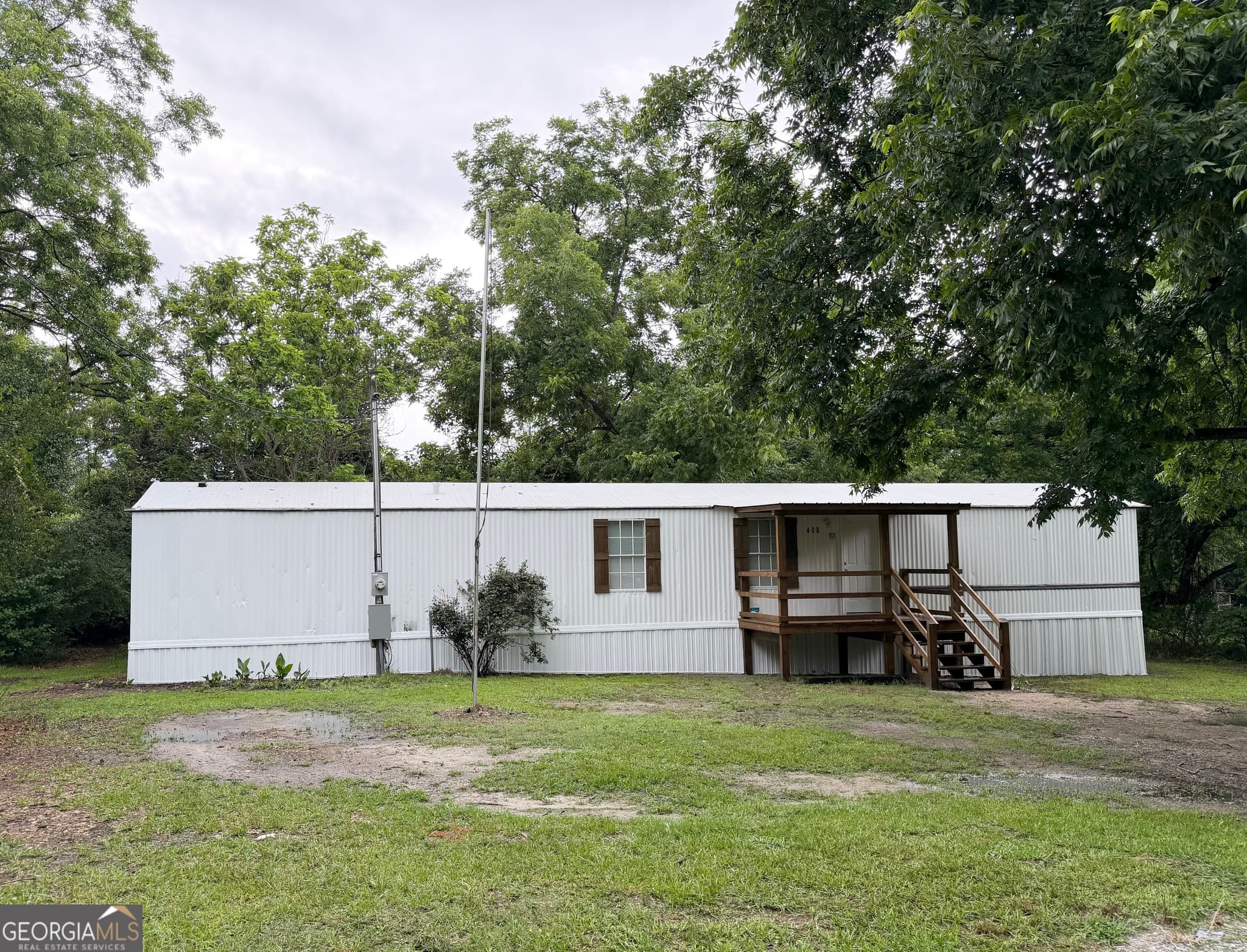 3 bedroom, 2 bathroom, 980 sq ft manufactured home,single family residence for sale at 408 Register Street, Dexter, GA 31019 — photo 1 of 18