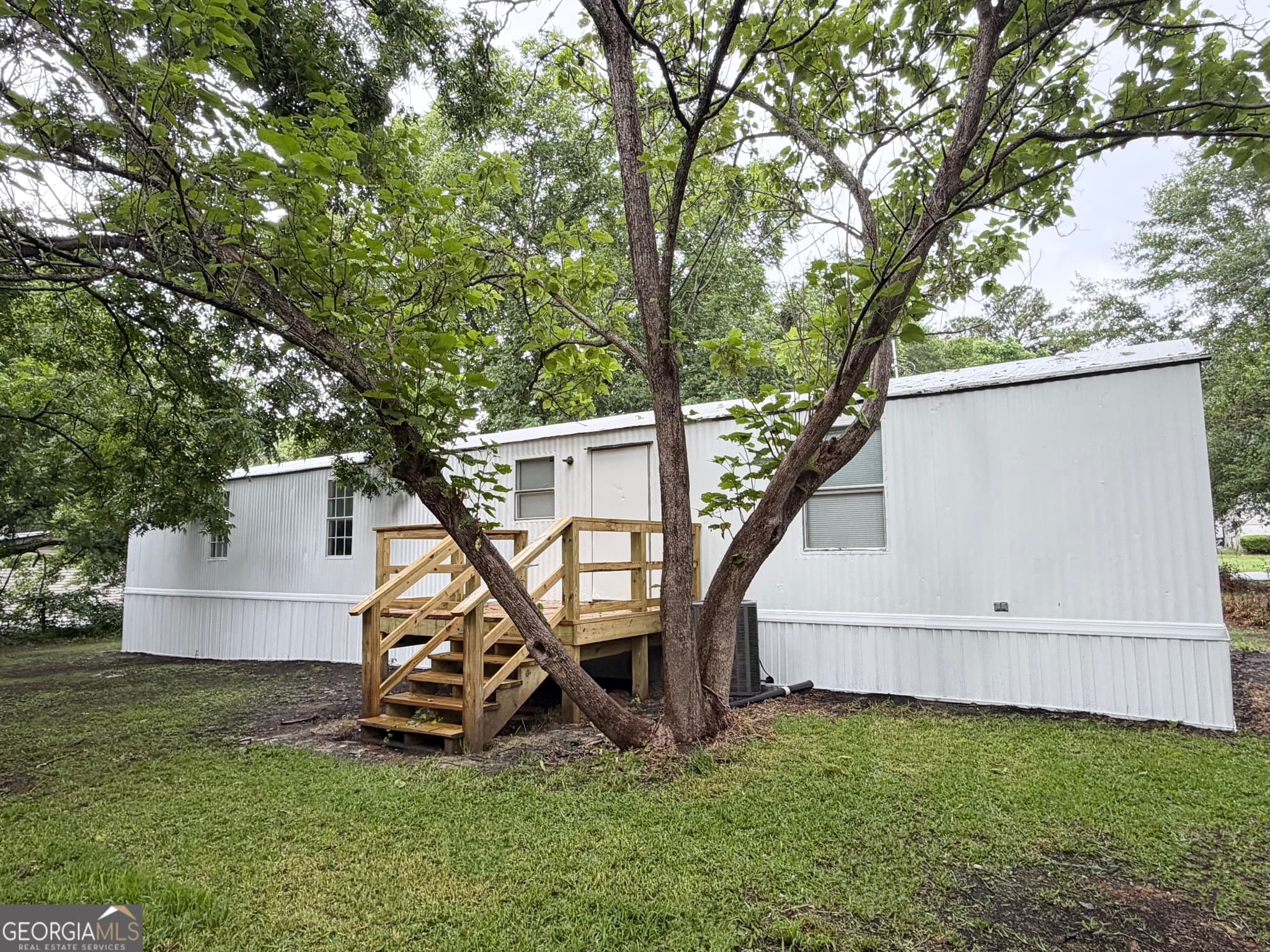 3 bedroom, 2 bathroom, 980 sq ft manufactured home,single family residence for sale at 408 Register Street, Dexter, GA 31019 — photo 4