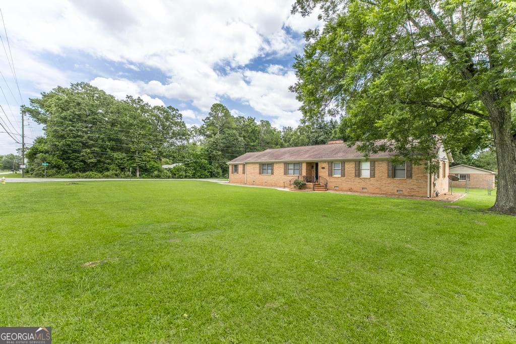 4 bedroom, 2 bathroom, 2,483 sq ft single family residence for sale at 3708 Jones Road, Macon, GA 31216 — photo 2
