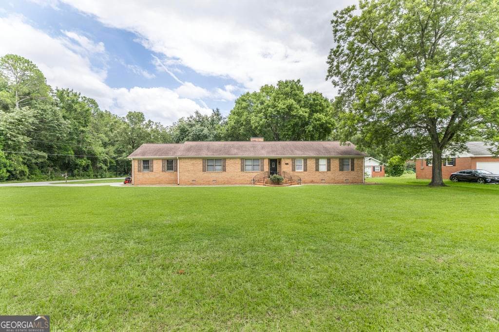 4 bedroom, 2 bathroom, 2,483 sq ft single family residence for sale at 3708 Jones Road, Macon, GA 31216 — photo 4