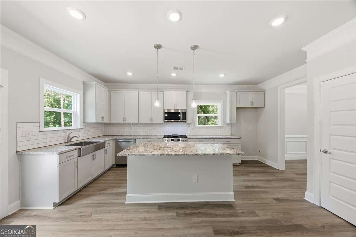 6 bedroom, 4.5 bathroom, 3,681 sq ft single family residence for sale at 3315 Trevi Trail, Douglasville, GA 30135 — photo 3