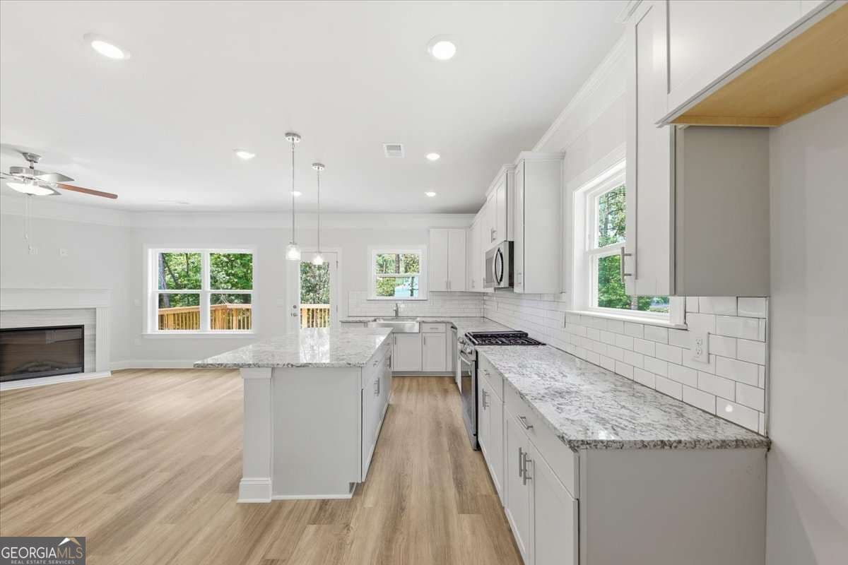 6 bedroom, 4.5 bathroom, 3,681 sq ft single family residence for sale at 3315 Trevi Trail, Douglasville, GA 30135 — photo 4