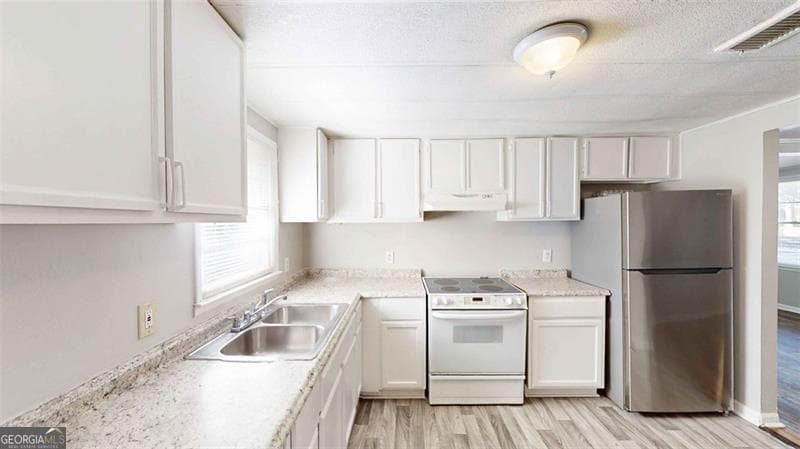 4 bedroom, 2 bathroom, 1,656 sq ft single family residence for sale at 1092 W ADRIAN Circle, Conyers, GA 30094 — photo 8