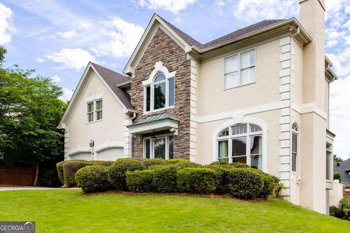 4 bedroom, 4.5 bathroom, 5,965 sq ft single family residence for sale at 4479 Chattahoochee Plantation Drive, Marietta, GA 30067 — photo 3