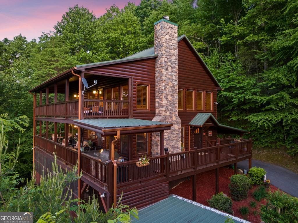 3 bedroom, 3 bathroom, 3,036 sq ft cabin,single family residence for sale at 115 Mountain High Drive, Mineral Bluff, GA 30559 — photo 1 of 60