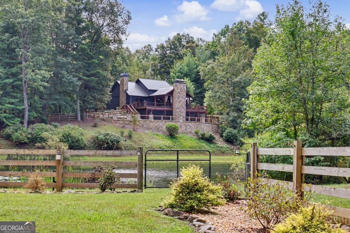 4 bedroom, 2.5 bathroom, 3,456 sq ft single family residence for sale at 3469 Tails Creek Church Road, Ellijay, GA 30540 — photo 2