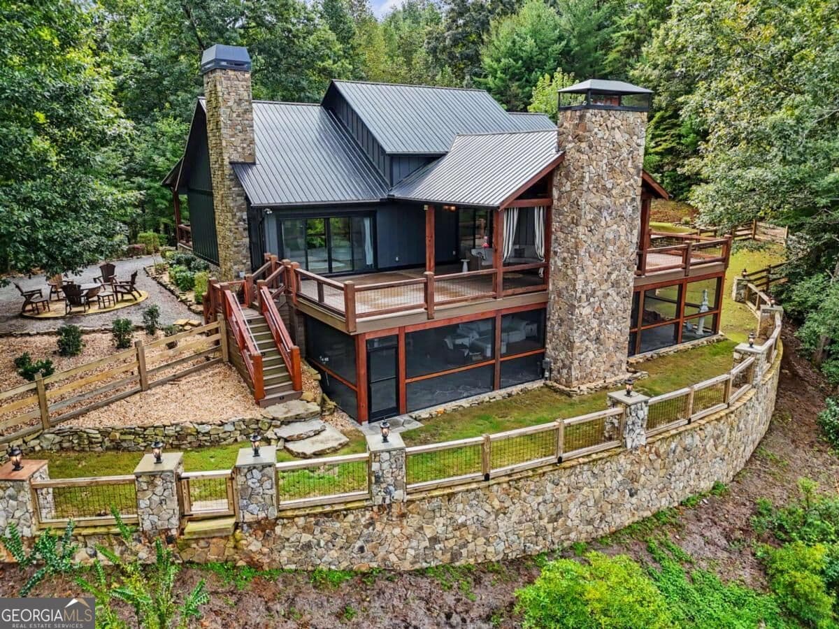 4 bedroom, 2.5 bathroom, 3,456 sq ft single family residence for sale at 3469 Tails Creek Church Road, Ellijay, GA 30540