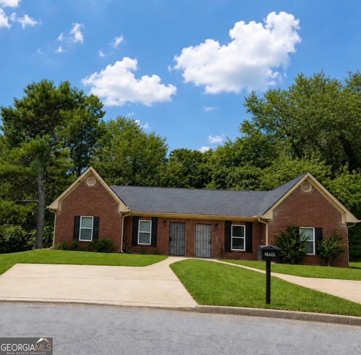 4 bedroom, 4 bathroom, 2,202 sq ft single family residence for sale at 310 Freeport Drive, Lawrenceville, GA 30046