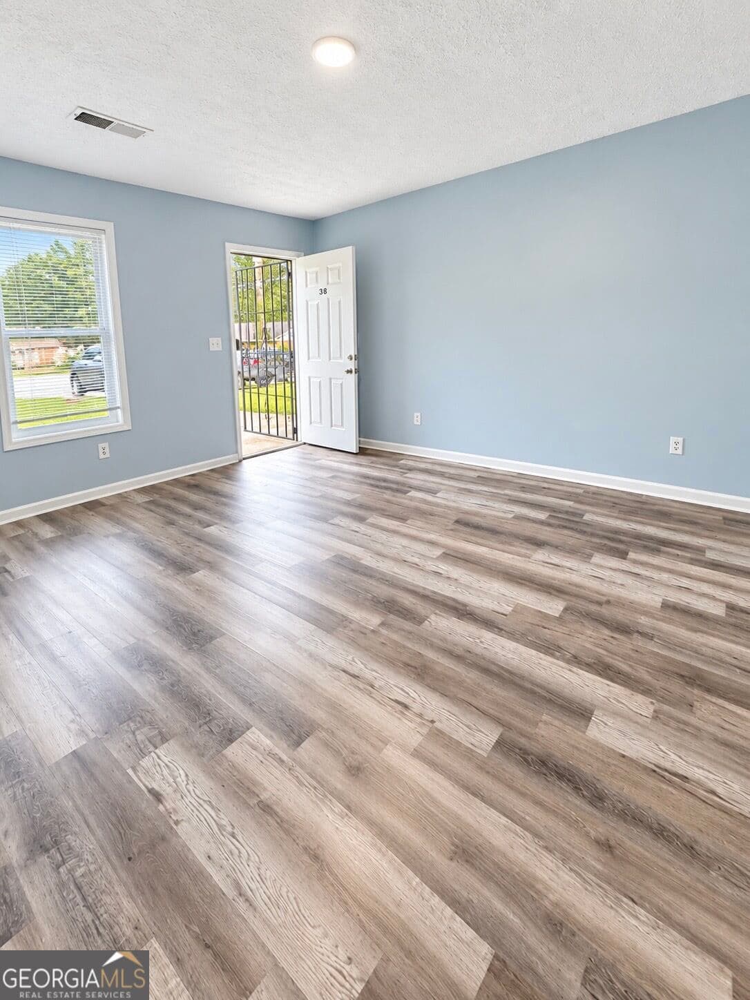 4 bedroom, 4 bathroom, 2,202 sq ft single family residence for sale at 310 Freeport Drive, Lawrenceville, GA 30046 — photo 5