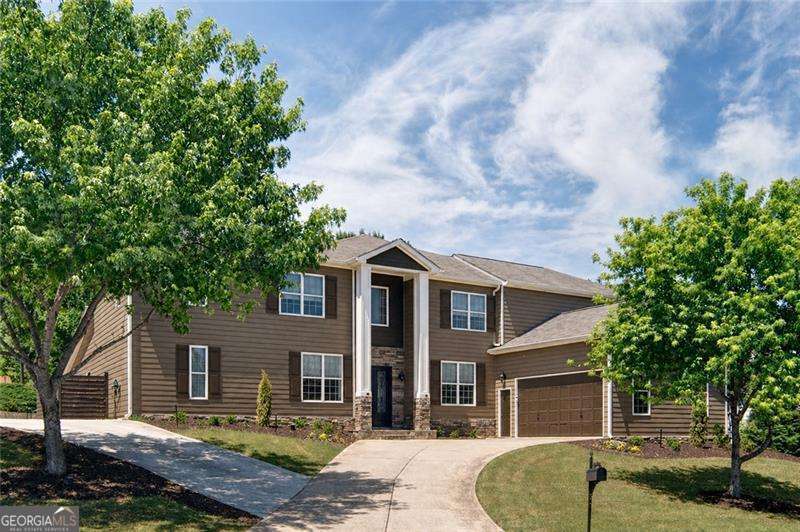 6 bedroom, 4.5 bathroom, 5,308 sq ft single family residence for sale at 232 Waters Lake Drive, Woodstock, GA 30188 — photo 2