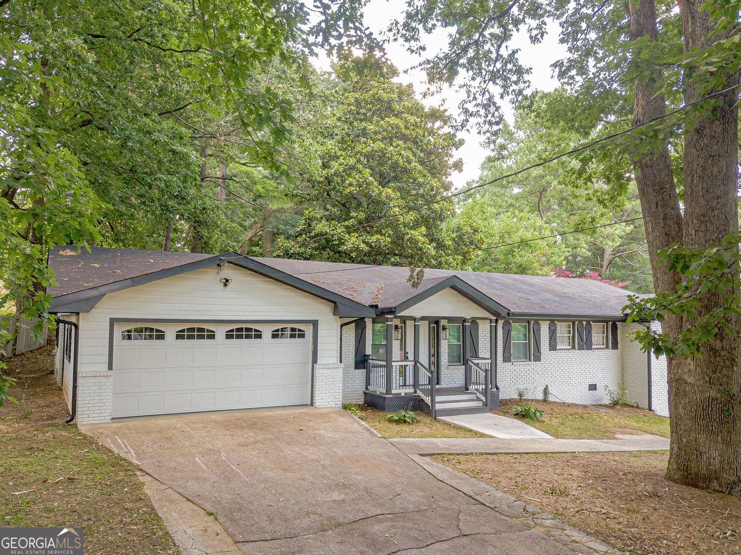 4 bedroom, 3.5 bathroom, 3,873 sq ft single family residence for sale at 3552 Springrun Drive, Decatur, GA 30032 — photo 1 of 81