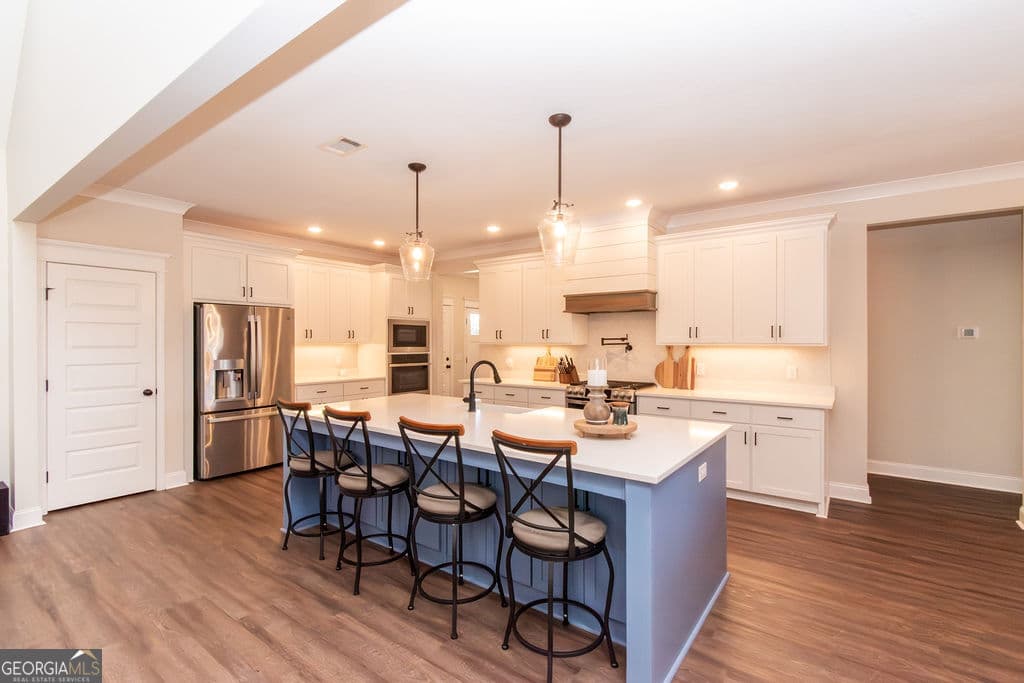 4 bedroom, 3.5 bathroom, 3,022 sq ft single family residence for sale at 1355 Old Louisville Road, Guyton, GA 31312 — photo 8