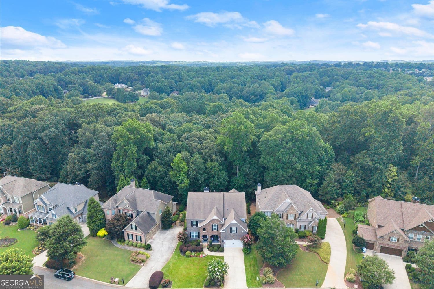 5 bedroom, 4 bathroom, 4,448 sq ft single family residence for sale at 4535 Manor Creek Drive, Cumming, GA 30040 — photo 4