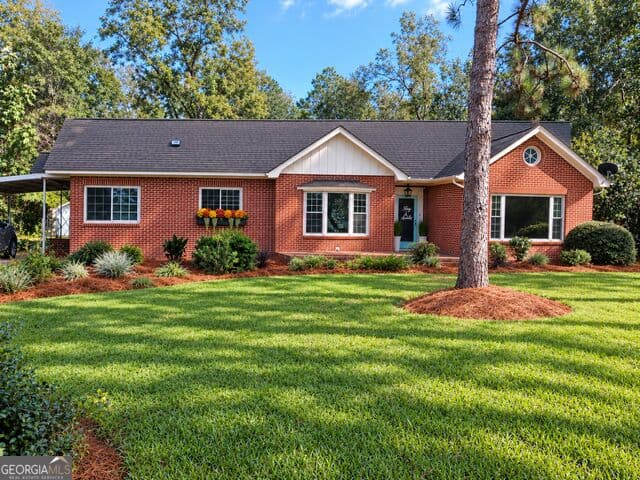 3 bedroom, 2 bathroom, 2,120 sq ft single family residence for sale at 347 S College Street, Metter, GA 30439 — photo 1 of 19