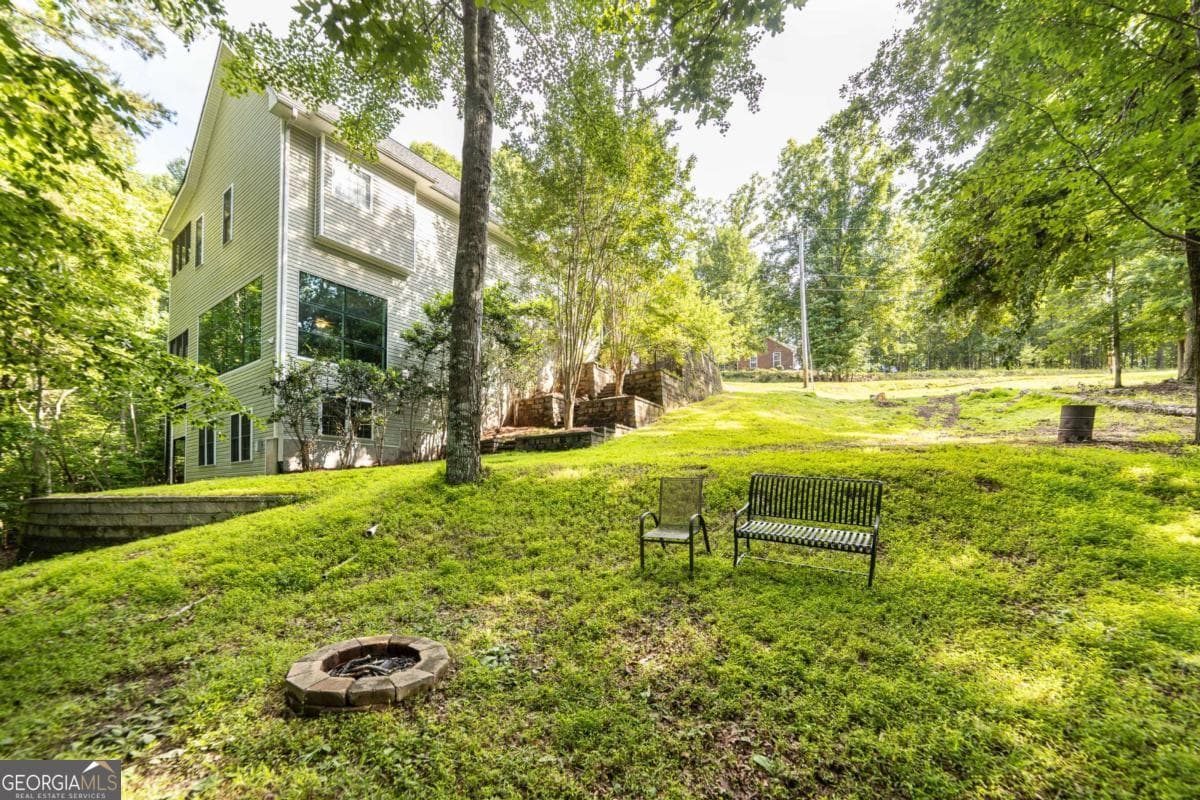 5 bedroom, 5 bathroom, 4,390 sq ft single family residence for sale at 7822 Beachwood Drive, Murrayville, GA 30564 — photo 10