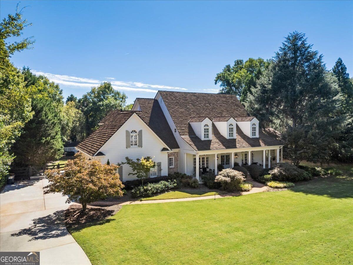 6 bedroom, 6.5 bathroom single family residence for sale at 105 Old Cedar Lane, Milton, GA 30004 — photo 2