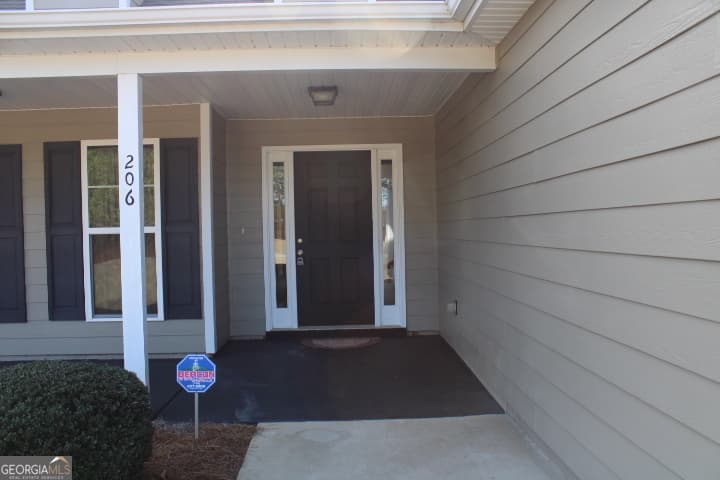 3 bedroom, 2 bathroom, 1,842 sq ft single family residence for sale at 206 Cole Forest Boulevard, Barnesville, GA 30204 — photo 9