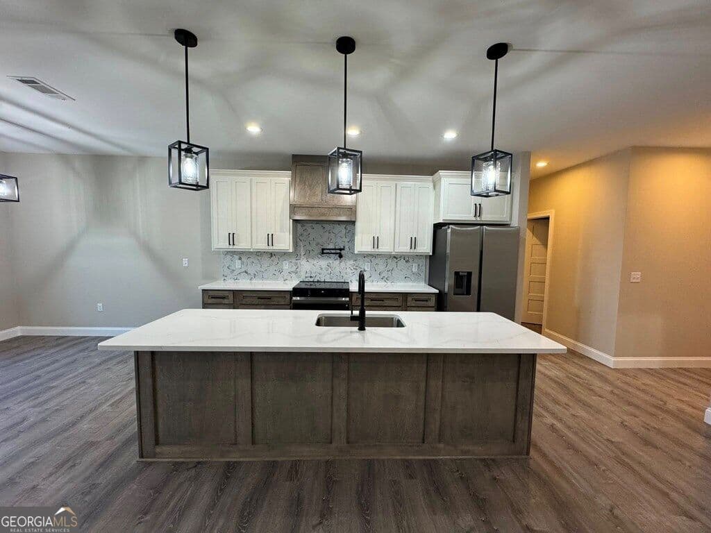 4 bedroom, 2 bathroom, 2,200 sq ft single family residence for sale at 1437 Dewey Thomas Road, Dexter, GA 31019 — photo 2