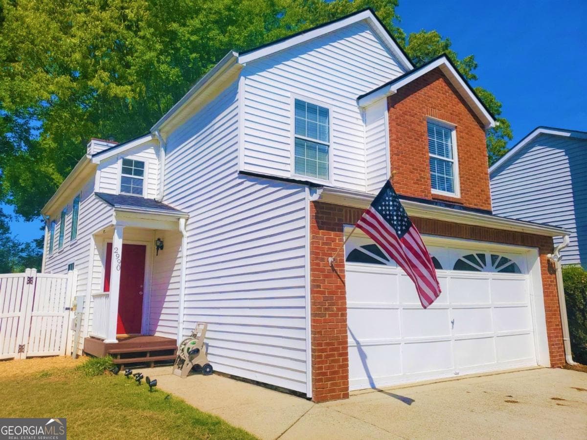 3 bedroom, 2.5 bathroom, 1,256 sq ft single family residence for sale at 2990 Barnwood Crossing, Duluth, GA 30097 — photo 1 of 19