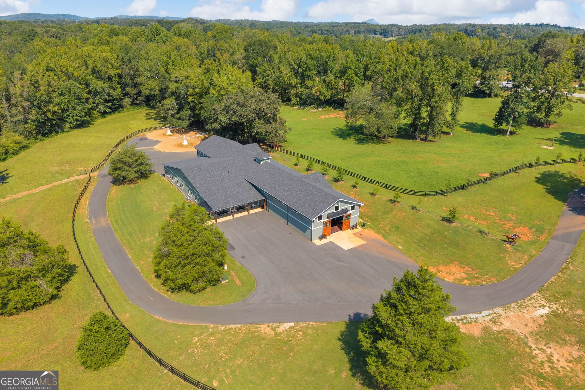 6 bedroom, 4.5 bathroom, 4,499 sq ft single family residence for sale at 5479 Highway 63, Toccoa, GA 30577 — photo 5