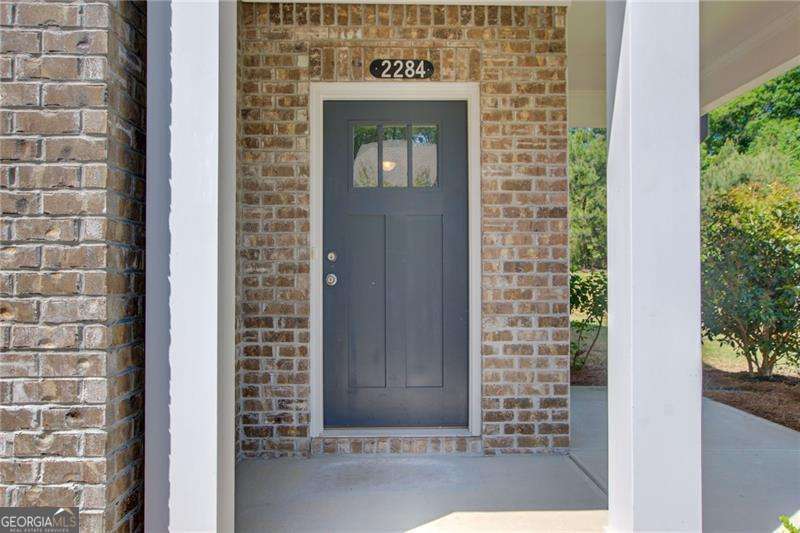 4 bedroom, 4 bathroom, 3,584 sq ft single family residence for sale at 2284 Stroller Drive, Powder Springs, GA 30127 — photo 2